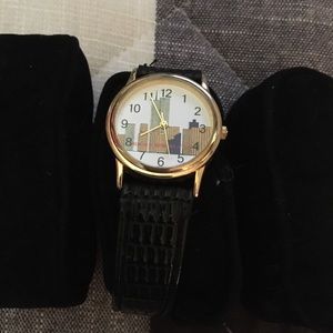 Preowned 9/11 goldtone watch w black band